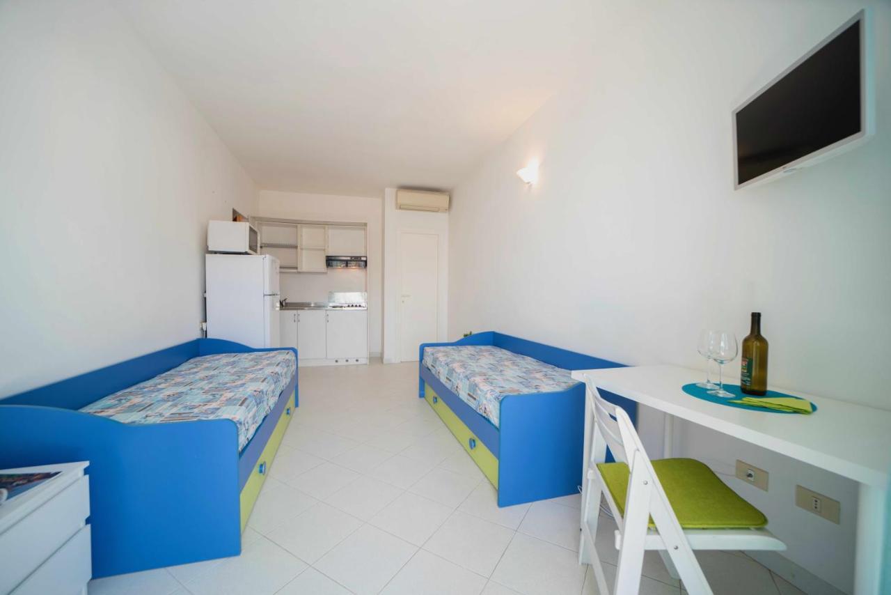 Aparthotel Le Sirene Seccheto Esterno foto