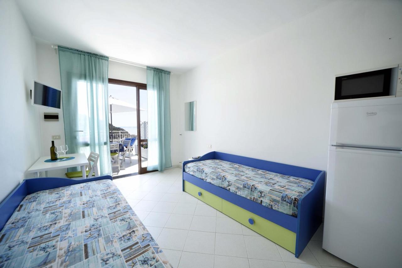 Aparthotel Le Sirene Seccheto Esterno foto