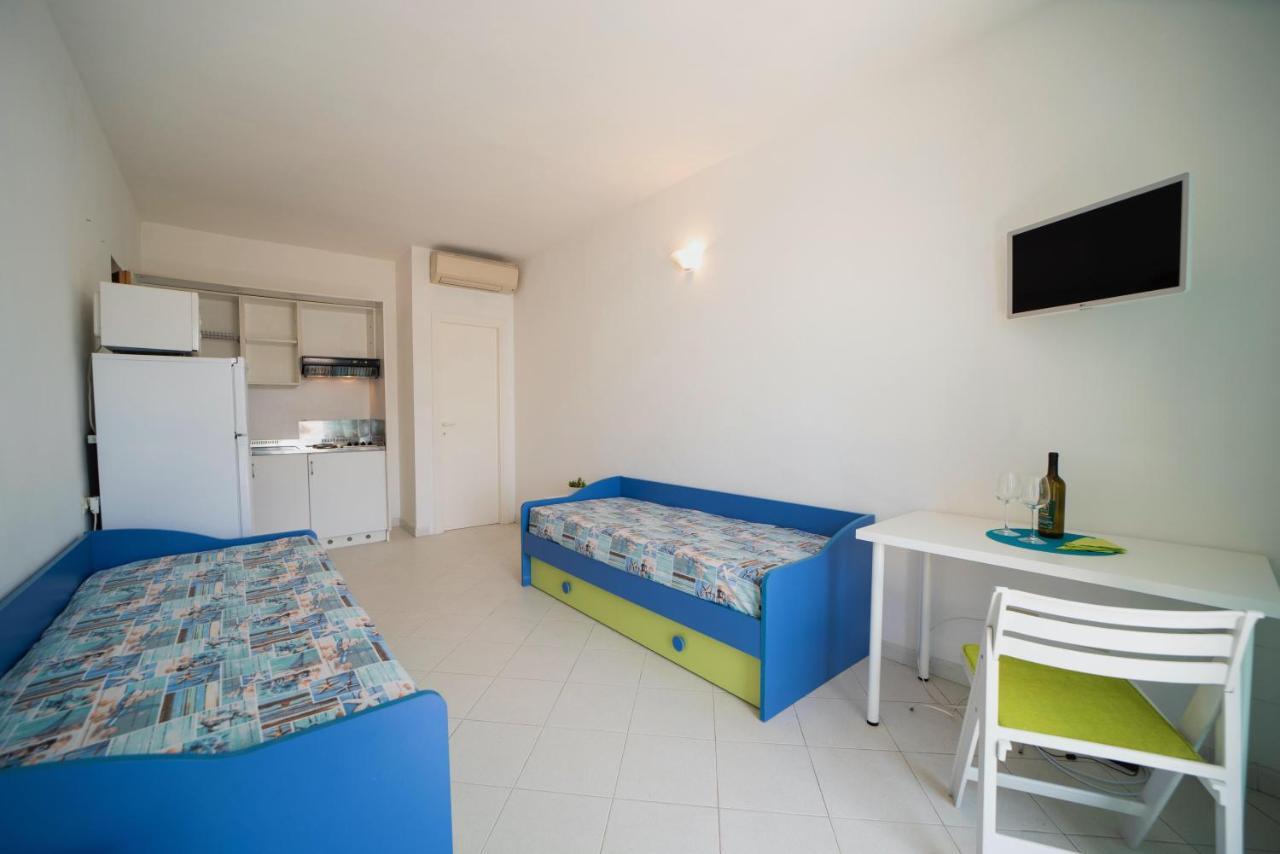 Aparthotel Le Sirene Seccheto Esterno foto