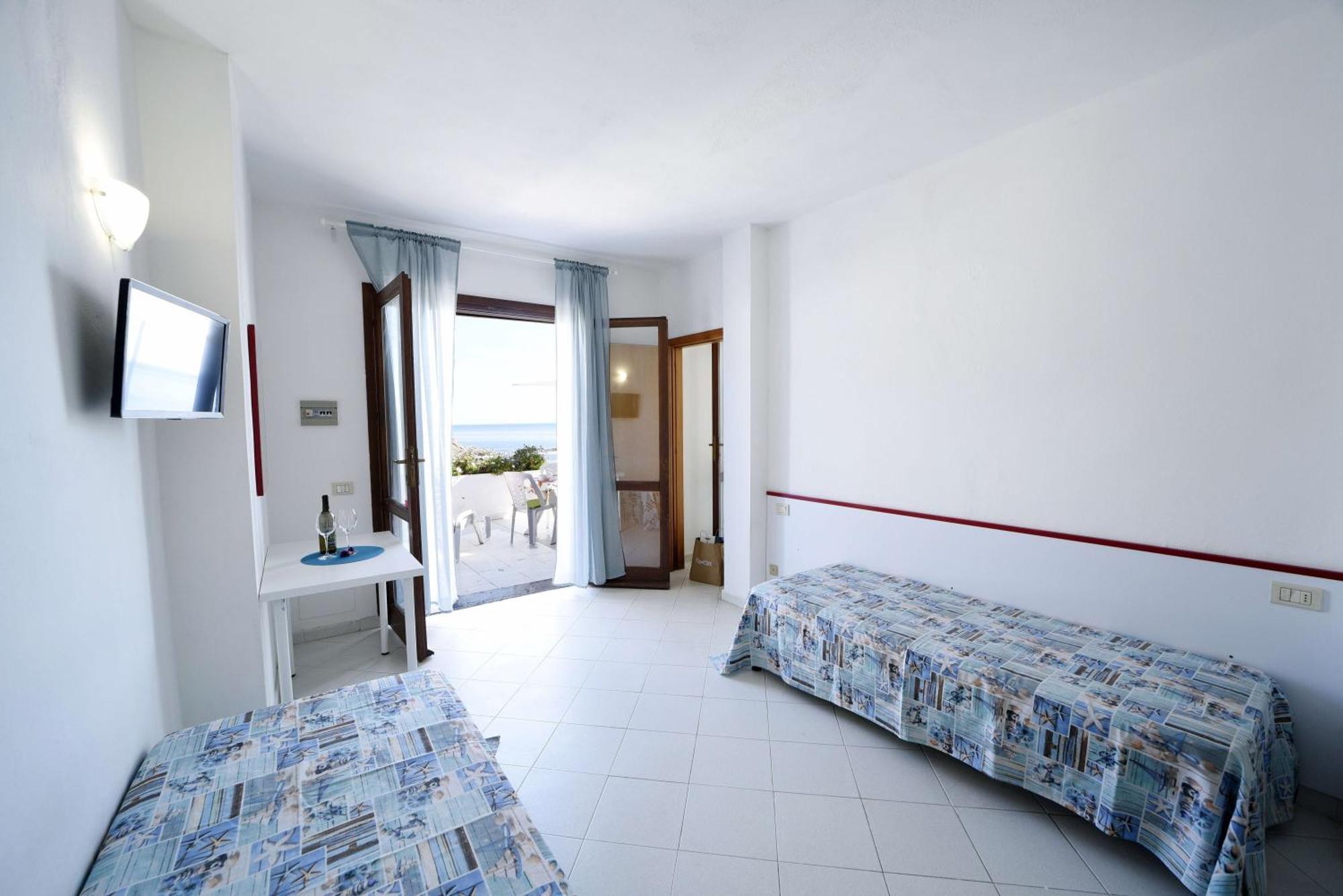 Aparthotel Le Sirene Seccheto Esterno foto
